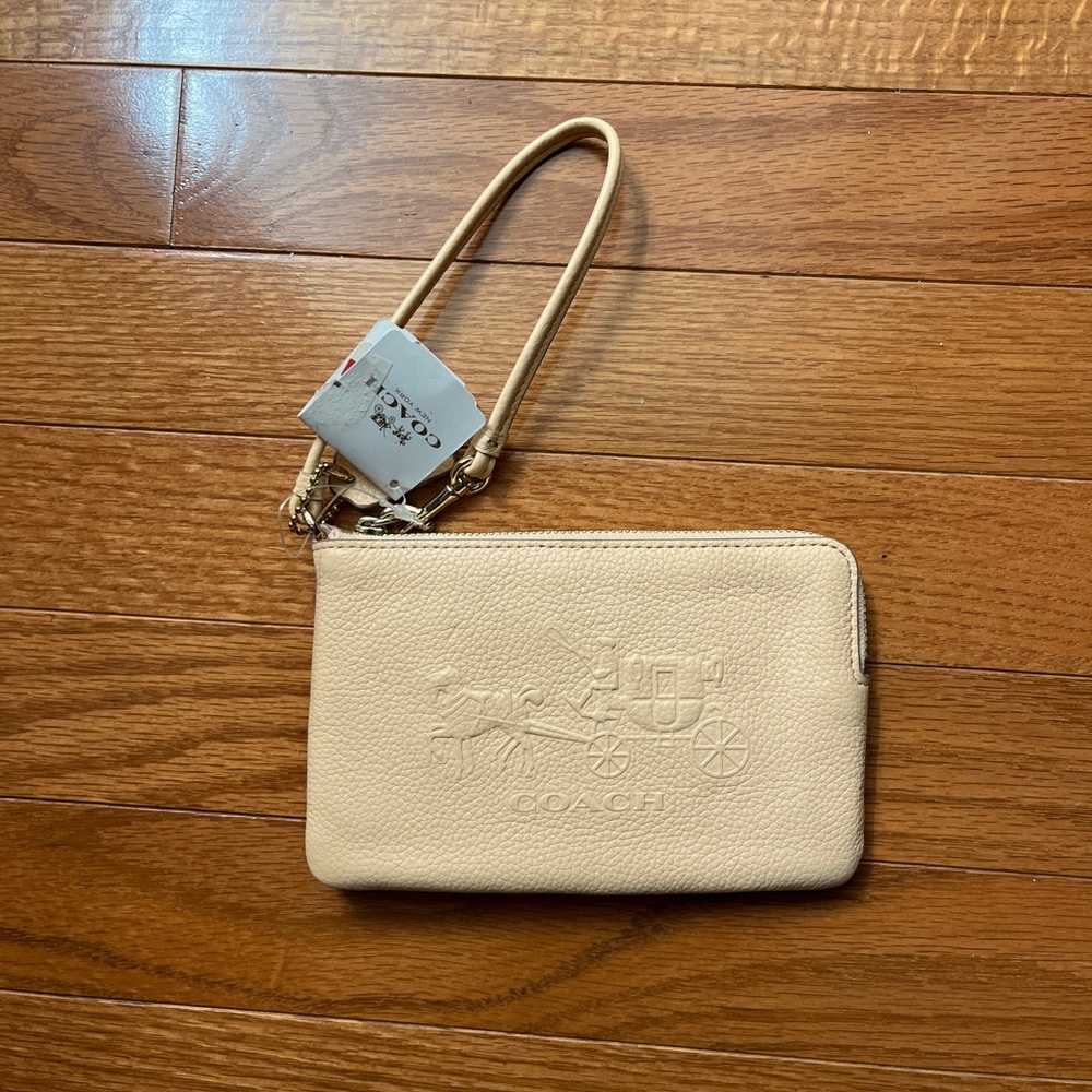 Peach coach wrislet wallet